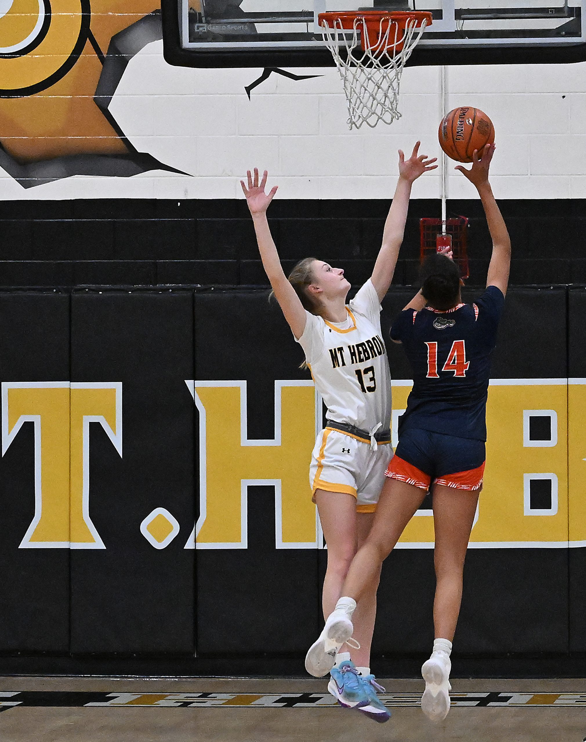 Reservoir #14, Sam Feher scores two in the paint in...